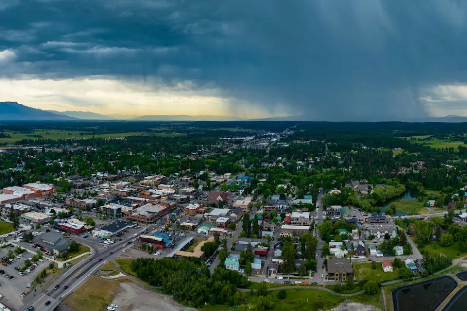 Aerial view of Whitefish, Montana with storm clouds in background